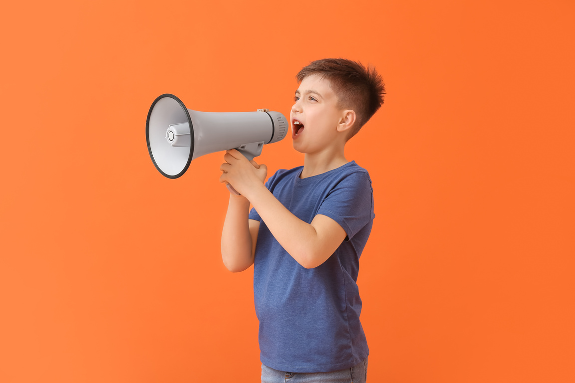 Screaming Little Boy with Megaphone on Color Background